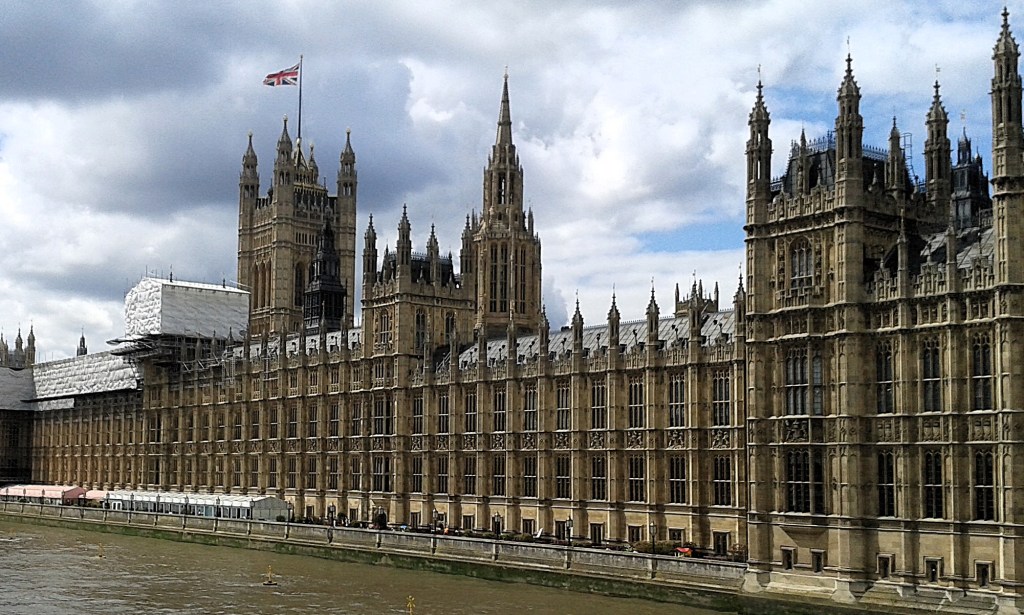 View of the Palace of Westminster, taken from Westminster Bridge, with the River Thames flowing beneath.