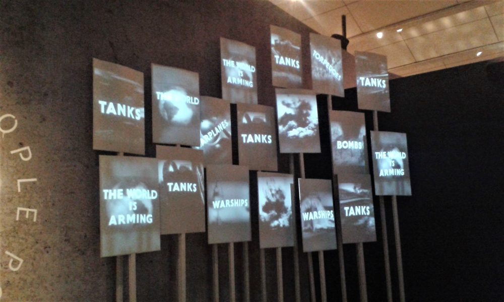 An anti-war exhibit projected on screens at the Imperial War Museum, London